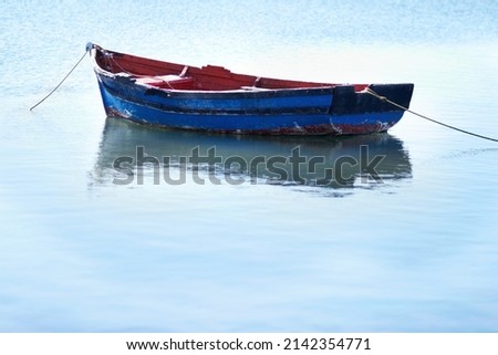 Similar – Image, Stock Photo Floating boat in peaceful clear water