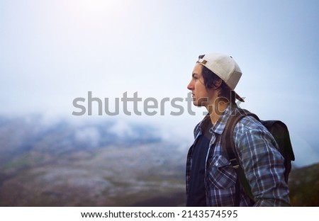 Similar – Image, Stock Photo Serious man admiring mountain in nature