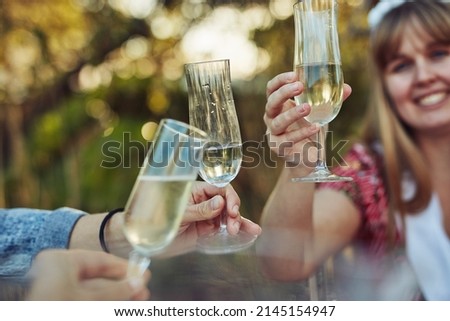 Similar – Image, Stock Photo Crop person having champagne poured into glass near pool