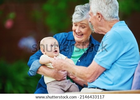 Be the grandparent you want them to remember. Cropped shot of a senior couple spending time with their grandson. Foto stock © 