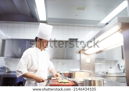 Similar – Image, Stock Photo Crop chef preparing sushi at table in restaurant