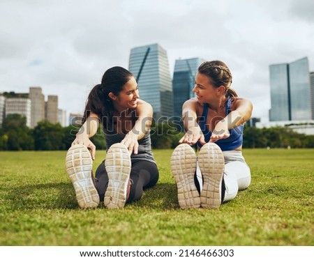 Similar – Foto Bild Junge Sportlerinnen bei Dehnungsübungen