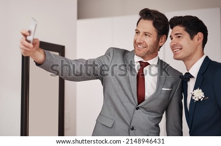 Image, Stock Photo Groom and best man putting on the suit