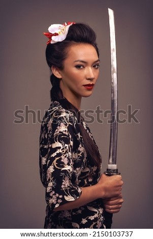 Similar – Image, Stock Photo Conceptual portrait of a woman amidst dark foliage, showing the concept of depression and isolation