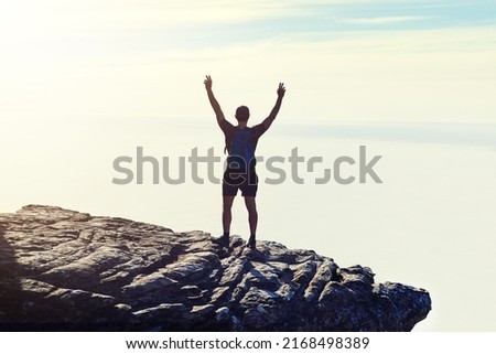 Similar – Image, Stock Photo Anonymous man enjoying mountain landscape and lake