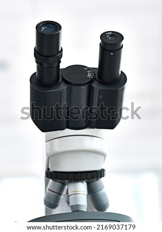 Are you up for doing some investigation. Still life shot of a microscope placed in a laboratory with its eyepiece facing upwards. Сток-фото © 