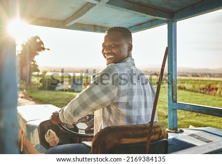 Similar – Image, Stock Photo Farmer on a tractor digs out potatoes from soil. Extract root vegetables to surface. Harvesting potatoes in autumn. Farming and farmland. Agricultural work in the field. Countryside.