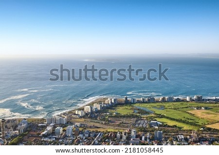 Coastal city near sea in evening