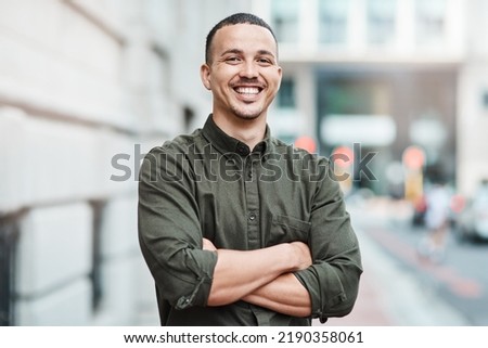 Similar – Image, Stock Photo Smiling ethnic man with headphones in city