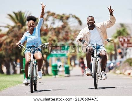 Similar – Image, Stock Photo Smiling black woman riding electric scooter on asphalt road