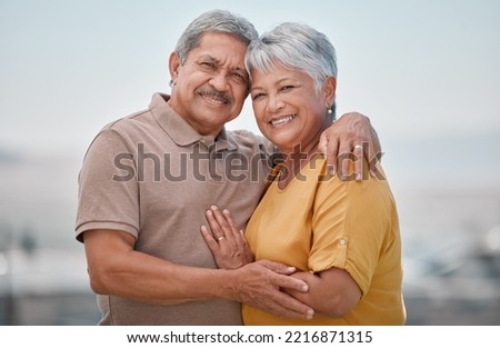 Similar – Image, Stock Photo Smiling couple embracing in forest sitting on tree roots