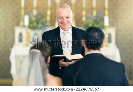 Similar – Image, Stock Photo Pastor at the altar table with the book of baptism