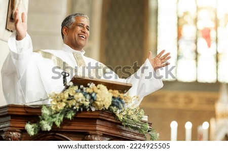 Similar – Image, Stock Photo Pastor at the altar table with the book of baptism