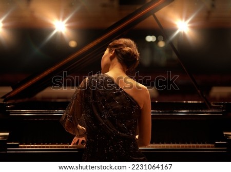 Similar – Image, Stock Photo Crop woman playing piano at home