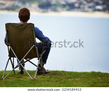 Similar – Image, Stock Photo Unrecognizable man resting at poolside