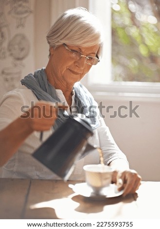 Similar – Image, Stock Photo Crop person pouring tea into bowl with herbs