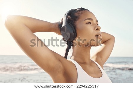 Similar – Image, Stock Photo Thoughtful young female athlete listening to music in studio