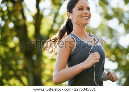 Image, Stock Photo Sporty young female runner in the forest.