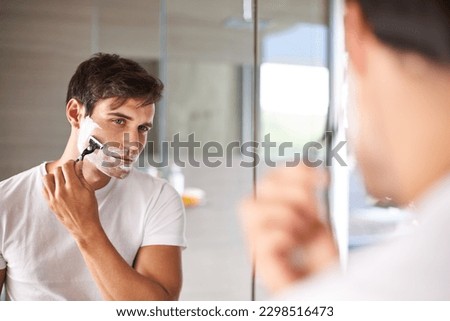 Image, Stock Photo Handsome bearded man shaving his beard, Young caucasian bearded man trimming beard in home during quarantine. Lifestyle concept.