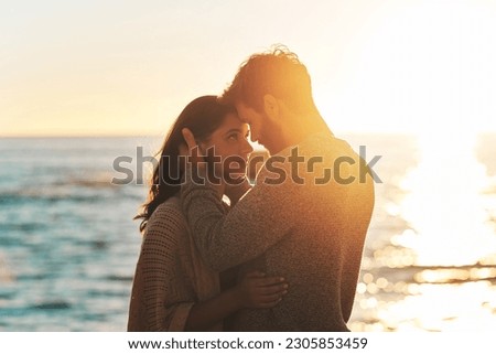 Similar – Image, Stock Photo Loving couple embracing on sofa at home