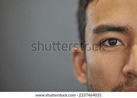 Similar – Image, Stock Photo Serious Asian man in face mask standing in gray corridor