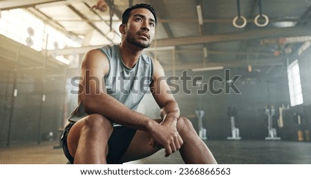 Image, Stock Photo Man in sportswear resting at stadium seat and use smartphone