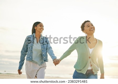 Similar – Image, Stock Photo Lesbian couple holding hands under the table and hiding their love