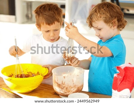 Similar – Foto Bild Fröhliche kleine Geschwister beim gemeinsamen Kochen