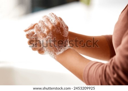 Similar – Image, Stock Photo Woman washing hands with hand sanitizer alcohol antibacterial to prevent germs, bacteria and avoid coronavirus infections
