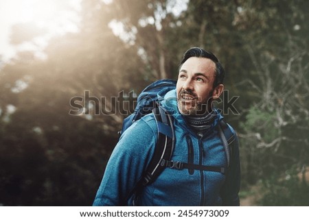 Image, Stock Photo backpacker man hiking in peak of mountain at sunset enjoying landscape. Lifestyle and nature