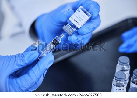 Similar – Image, Stock Photo covid-19 vaccine needle and face mask isolated on yellow background