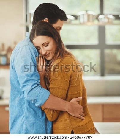 Similar – Image, Stock Photo Cheerful couple hugging in kitchen at home