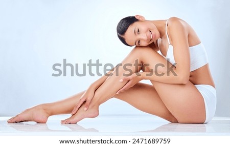 Image, Stock Photo Legs of a woman in a white culotte with colorful geometric shapes on a cobbled pavement. Casting shadows. Walking, pedestrian