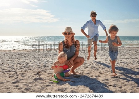 Boy walking in water of lake