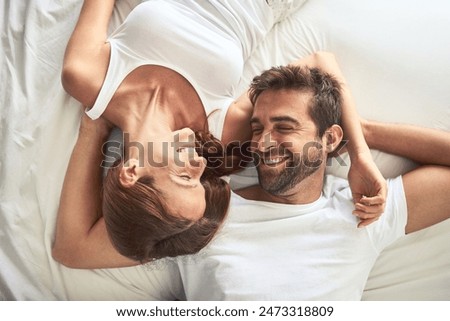 Similar – Image, Stock Photo Passionate couple on bed in bubble hotel