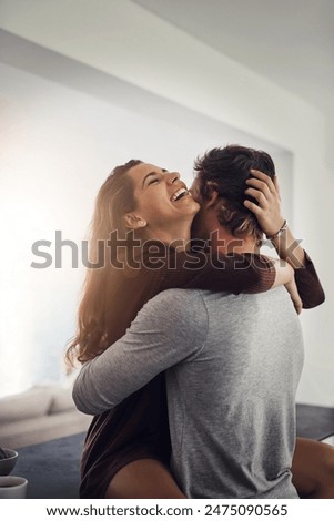 Similar – Image, Stock Photo Cheerful couple hugging in kitchen at home