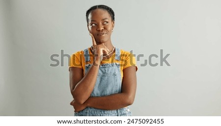 Similar – Image, Stock Photo Young black woman with eyes closed against wall