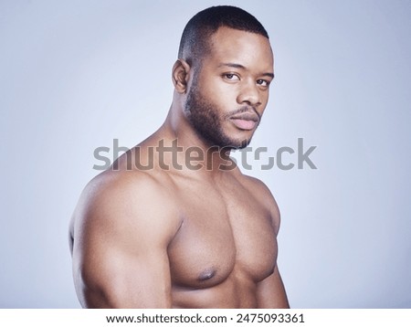 Similar – Image, Stock Photo Serious shirtless black man with makeup and flowers