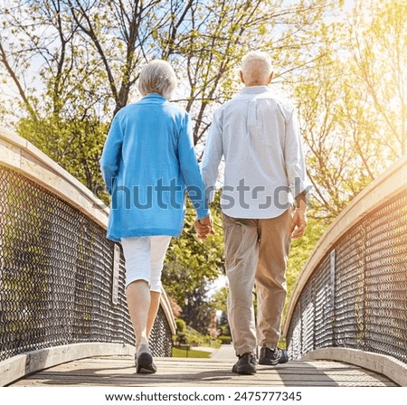 Similar – Image, Stock Photo Elderly couple walking a forest path along the seashore holding giant inflatable flamingo and unicorn. Funny active pensioners enjoying summer vacation on the beach in Northern Europe