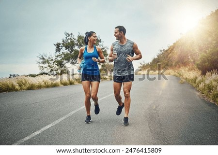 Similar – Image, Stock Photo Confident man exercising on cycling machine in gym