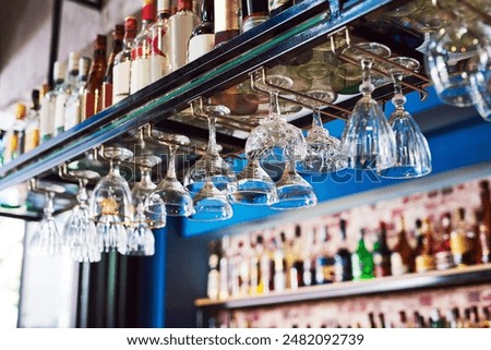 Similar – Image, Stock Photo Clean glasses hanging in bar