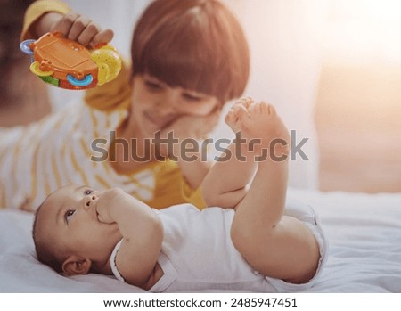 Similar – Image, Stock Photo Lovely and curious newborn lying down in her little bed