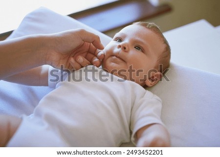 Similar – Image, Stock Photo Lovely and playful newborn in her bedroom at home