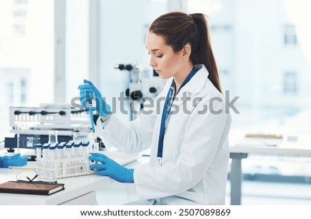 Similar – Image, Stock Photo Scientist working in the corona virus vaccine development laboratory research with a highest degree of protection gear.