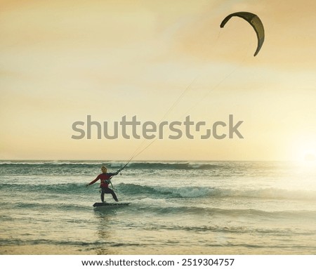 Similar – Image, Stock Photo Female kite surfer riding on board in sea