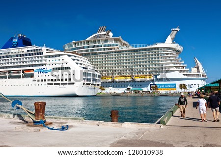 NASSAU, BAHAMAS - JAN. 13:Cruise passengers on pier in Bahamas port of call, on Jan. 13, 2013. Cruises to the Bahamas are abundant as the majority of cruise ships include the Bahamas in the itinerary.