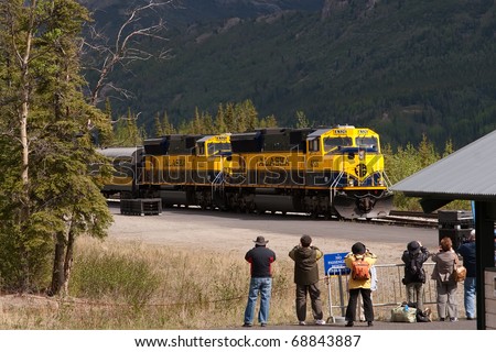 DENALI, AK - MAY 29:  Passenger wait to board the Alaska Railroad System in Denali, Alaska on May 29, 2009.
