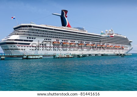 OCHO RIOS, JAMAICA - JULY 14:  Carnival cruise ship docks in Ocho Rios, Jamaica on July 14, 2011, once the most famous Jamaican port, is now losing popularity to the newest port located in Falmouth.