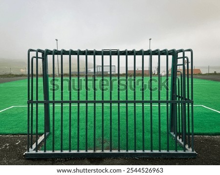 Similar – Image, Stock Photo Metal soccer goal on the soccer field, which was closed with a flutter band because of Corona