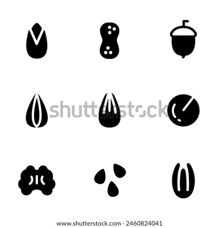 Nuts icons set. Set of Various Nuts and Seeds in Monochrome Style. Almonds, Pistachios, Peanuts, Acorns, Walnuts, Macadamia, Hazelnuts, Pine Nut, Brazil Nut.